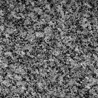 Gray granite stone background. Aged rough rock material texture top view