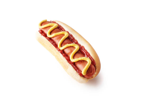 istock hot dog with ketchup and mustard, isolated on white background 1453986680