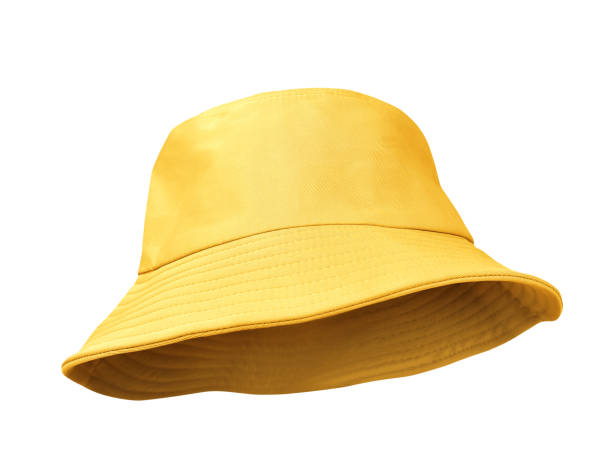 sombrero de cubo amarillo aislado sobre blanco - accesorio de cabeza fotografías e imágenes de stock