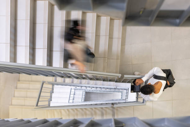 istock Students in motion on the stairs. 1453990500