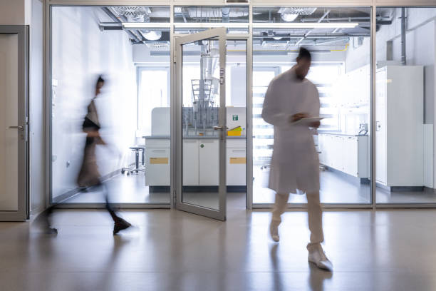 istock The laboratory assistant exits the laboratory. 1453990502