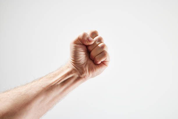 Male hand in front of white background