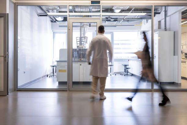 istock The laboratory assistant exits the laboratory. 1453991731