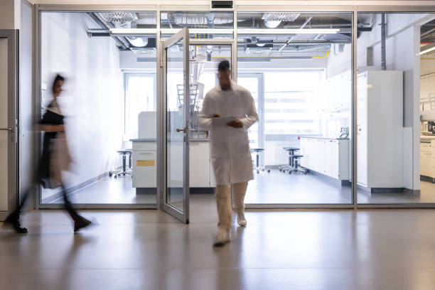 istock The laboratory assistant exits the laboratory. 1453991732