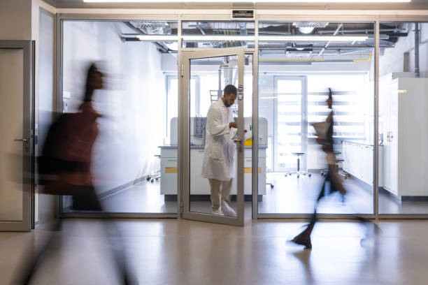 istock The laboratory assistant exits the laboratory. 1453991758