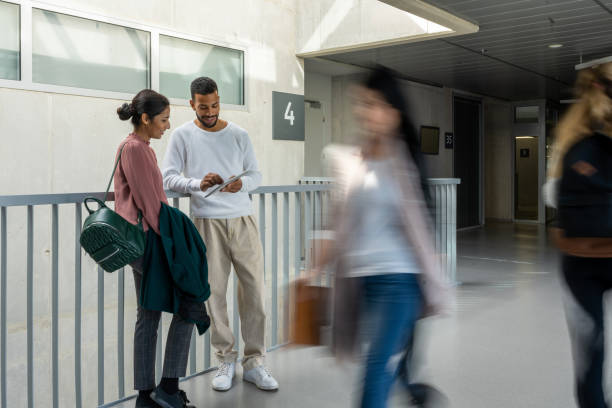 istock Students talk in the corridors of the university. 1453991785