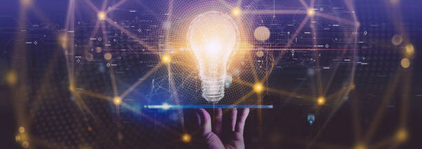 istock Creativity on connectivity.Innovative idea.Inspiration and network. Hand holding digital tablet light bulbs as symbol of innovation on global city network connection. 1453992972