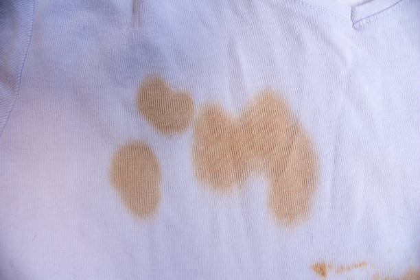 istock Food stain on white t-shirt 1453994540