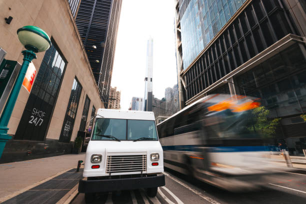 istock Post Service trucks in New York City 1453994595