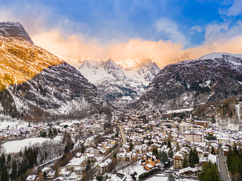 Aerial view of Courmayeur with snow from drone, Italian Alps in Valle d'Aosta at Christmas time
