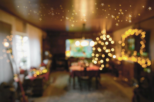 Festively Illuminated Family Room with Christmassy Decoration - Blurry Impression