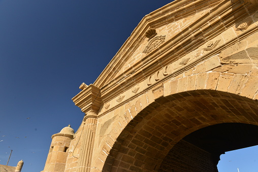 Medina city wall entrance close to the port.