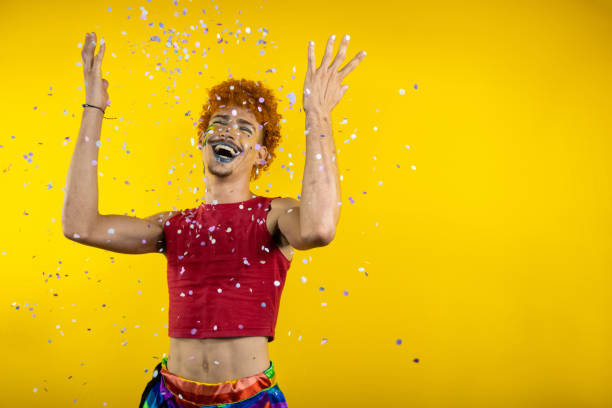 istock Man throwing confetti at brazilian Carnaval 1454004584