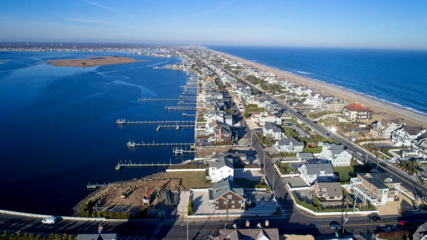 istock Mantoloking NJ bay and Atlantic Ocean looking north 1454006024