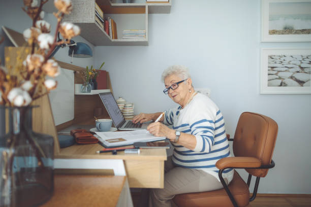 istock Senior woman at home 1454008864