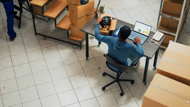 istock Male startup owner working on financial planning and logistics 1454009109