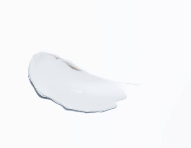 istock Liquid cream cosmetic smudge texture on a white isolated background 1454009137