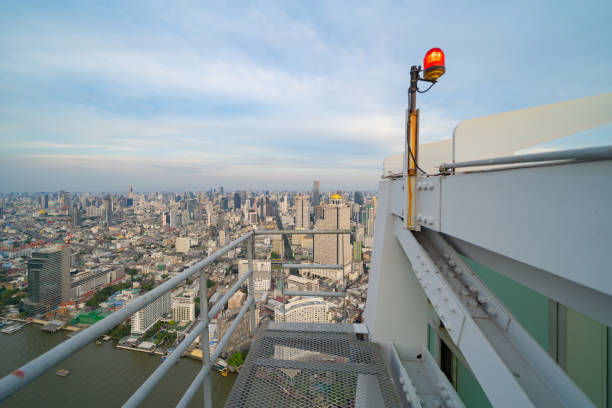 istock Empty space with sky park on private rooftop terrace of condominium or hotel, high rise architecture building with urban city  town, Bangkok, Thailand. 1454009190