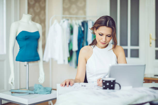 istock Fashion designer is working in the office 1454009341