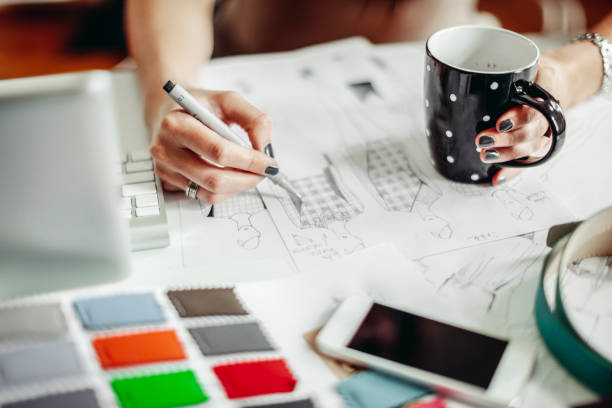 istock Fashion designer is working in the office 1454009387