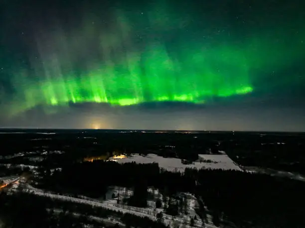 Photo of Aurora Borealis, Northern lights above the countyside of Finland 01