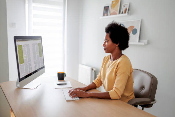 istock Businesswoman using computer and having video call at home office 1454011006