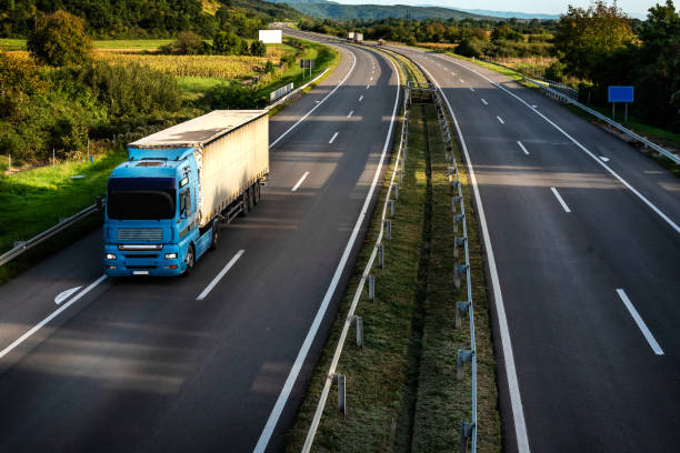 istock Big blue truck on Highway 1454015406