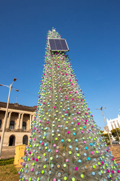 istock Eco-Friendly Christmas Tree Made of Plastic Bottles and Solar-Powered Christmas Lights: A Sustainable Holiday Tradition 1454015431