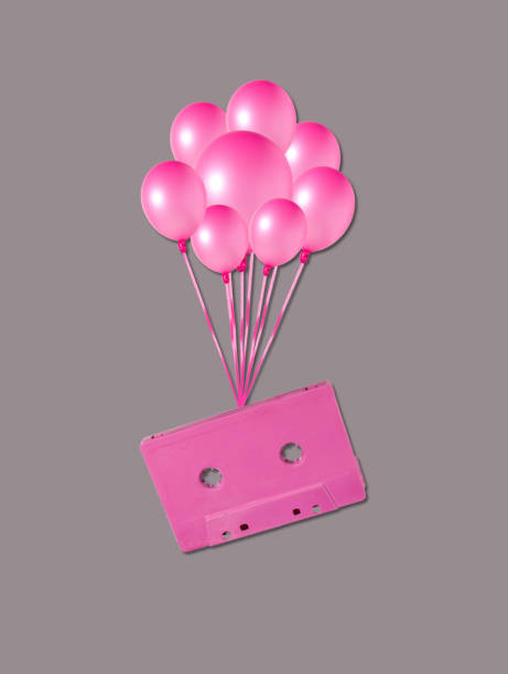 istock music retro cassettes flying with balloons, creative art design 1454016910