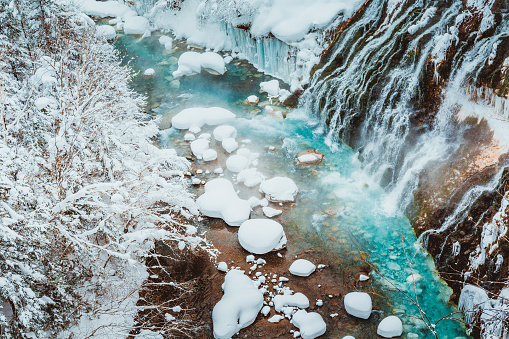 Shirahige waterfall during winter season at Biei, Hokkaido, Japan
