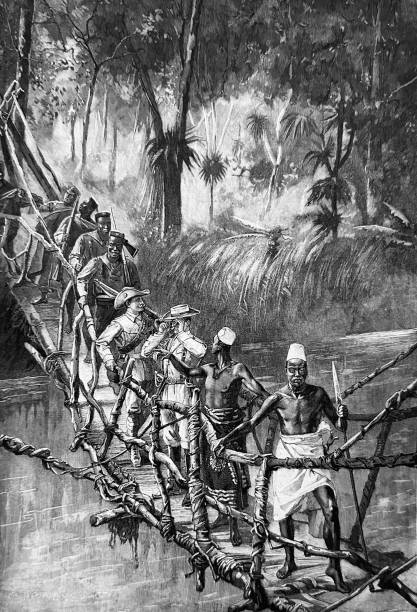 istock Crossing a river on a suspension bridge in the jungle in Africa 1454019765