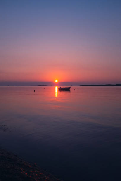 istock Sunrise over Greek beach. 1454019892