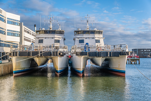 Service ships for workers with oil and wind in the North Sea, here in Esbjerg harbor, Denmark
