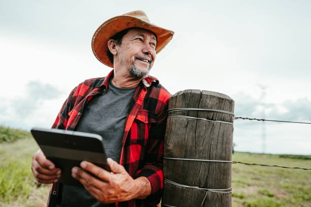 istock Portrait of a country man using digital tablet 1454021007