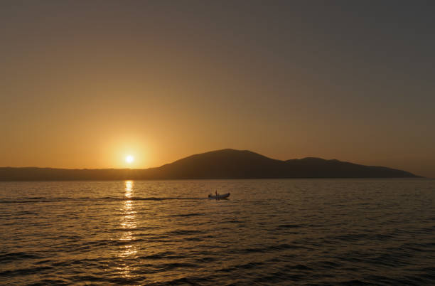 istock Sunset over the sea 1454021045