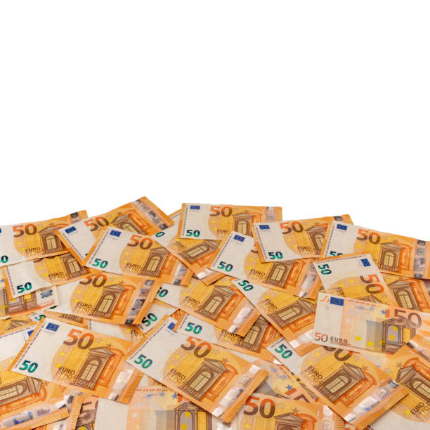 istock Banknotes of fifty euro scattered, copy space 1454022868