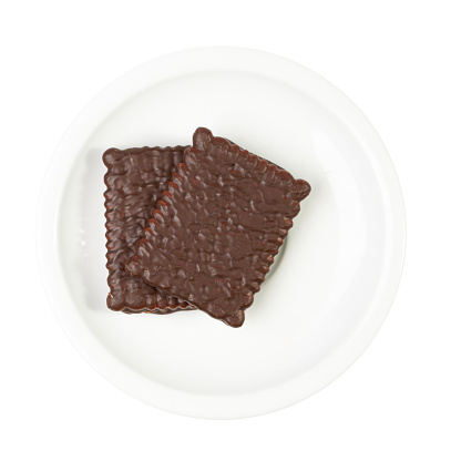 Chocolate Biscuit on Saucer Isolated, Black Quadratic Cookie, Dark Soft Biscuits, Square Butter Cookies, Fresh Sweet Cocoa Cracker on White Background Top View
