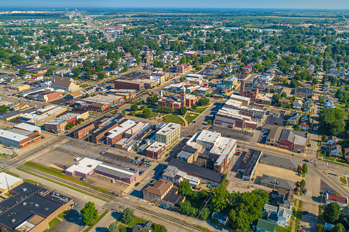 Aerial View of Greensburg, IN Downtown and Courthouse.  The famous Tower Tree that sticks out of the top of it.