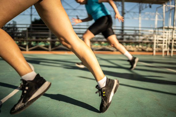 istock People running at court - Low section 1454024936