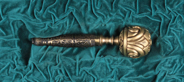 istock golden scepter on green velvet 1454025905