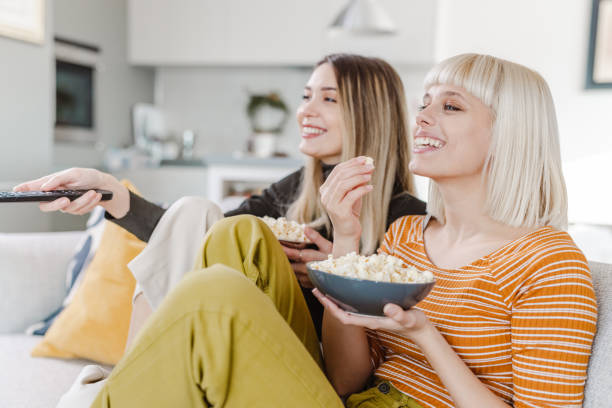 istock Young women watching TV show 1454026462