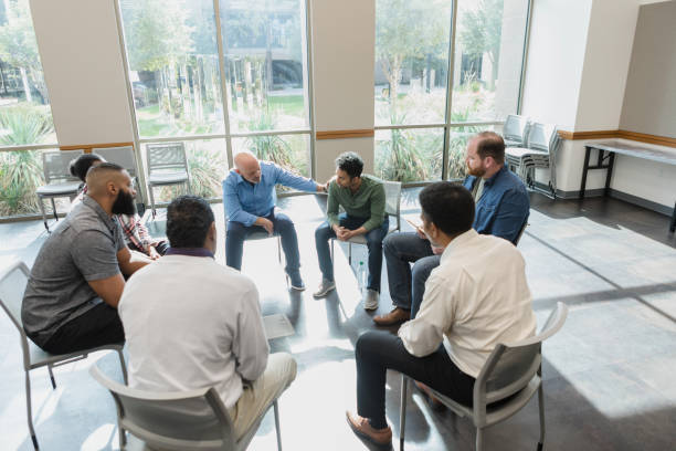 istock Tall view of group therapy 1454026660