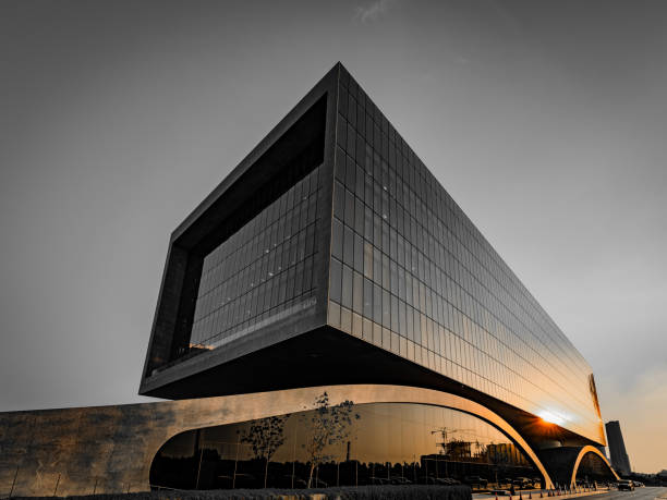istock Closeup of a modern building with a cloudless sky in the background 1454028674