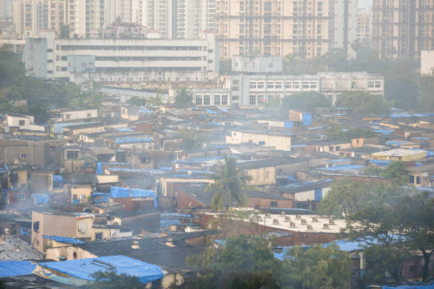 A skyline cityscape of Kandivali with high rise skyscrapers rising above slums.