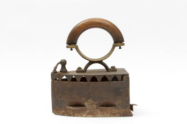 istock Old coal iron isolated on white background. Vintage household utensils. 1454031903