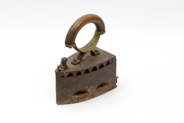 istock Old coal iron isolated on white background. Vintage household utensils. 1454033901