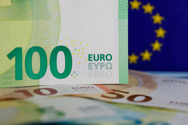 Euro money, banknotes with European union flag stock photo