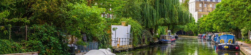 People living and working on the tranquil waters of the Regent’s Canal outside Camden Lock in the heart of Central London, UK.