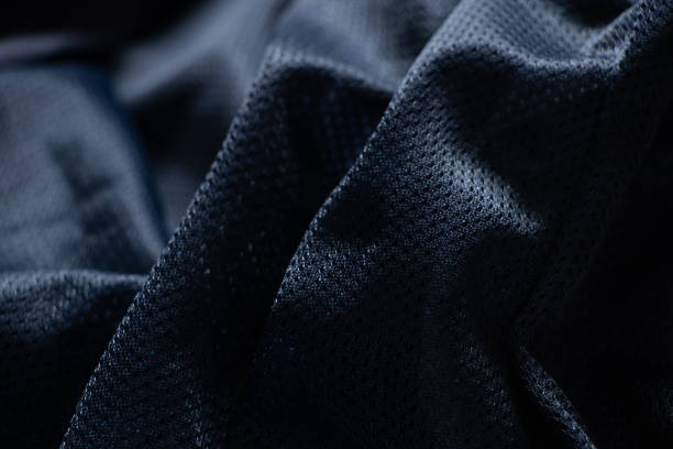 istock dark blue fabric wrinkled as background close up 1454044539