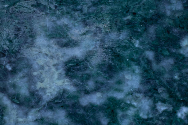 istock dark green marble close up background close-up 1454045926
